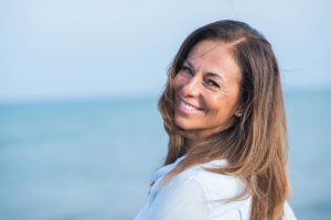 Middle aged woman smiling. 